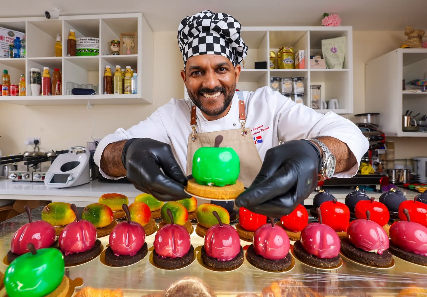 Chef Victor with his iconic fruit pastry and croissant display