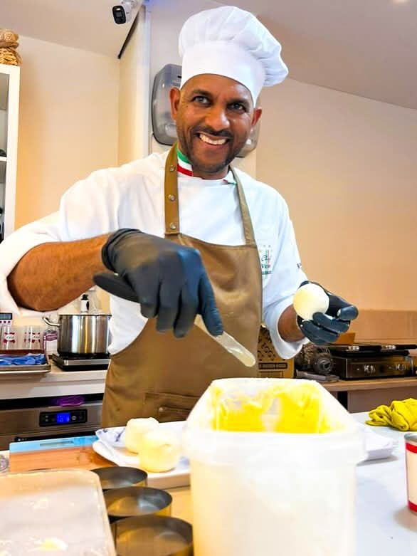 Chef Victor smiling in the kitchen