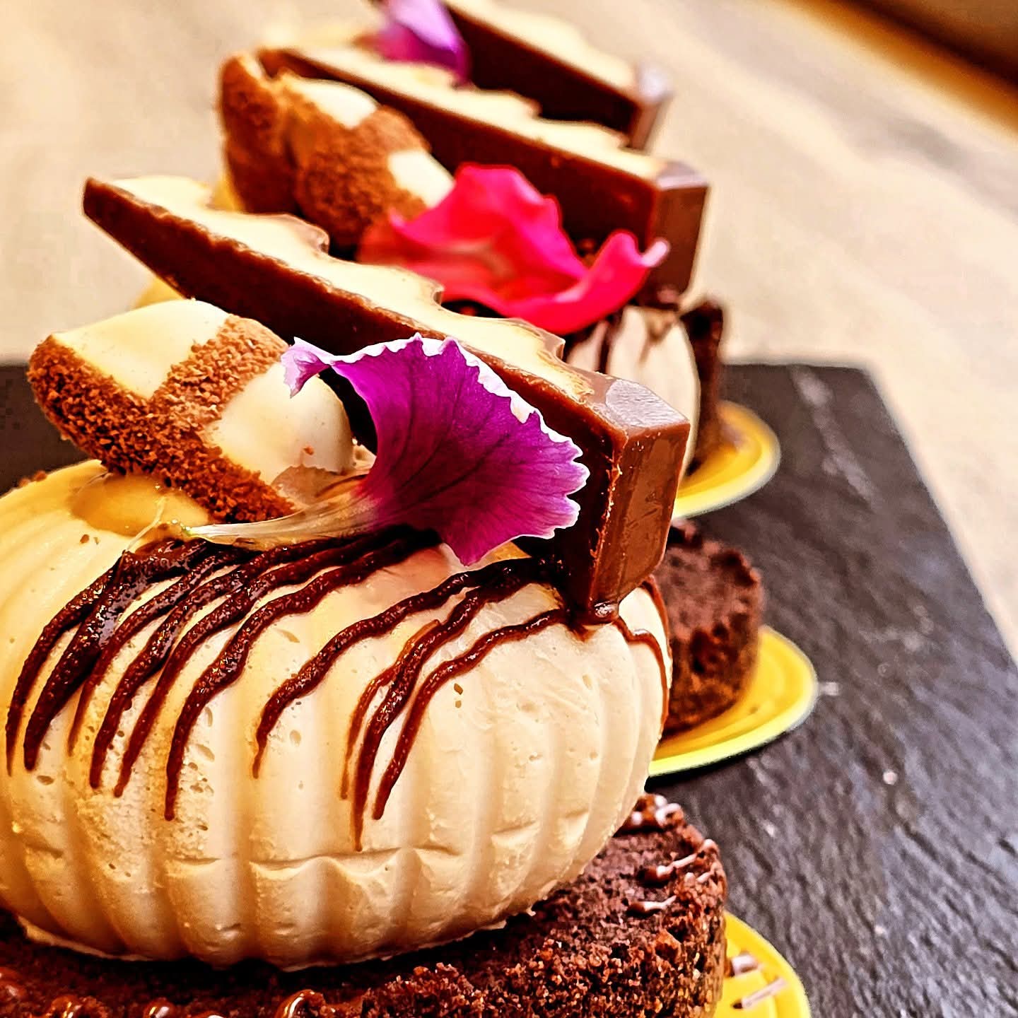 Chocolate dessert with edible flower