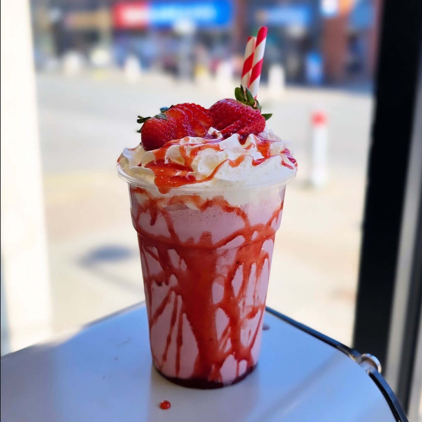 Strawberry milkshake with cream